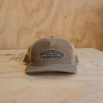 Arch Trucker Hat - Tan Bradley Mountain 